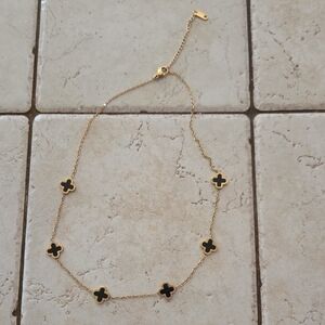 Elegant Gold and Black Clover Necklace